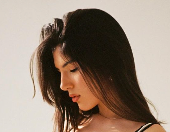 What’s That Big Thing In Her Hand??