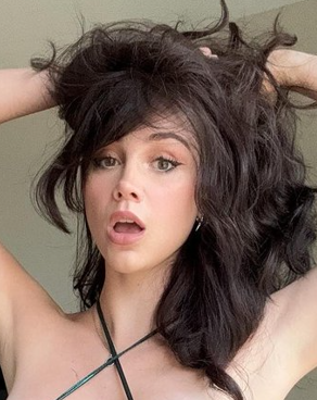 Smoking Hot Brunette Slut Teases in Shiny Green Dress