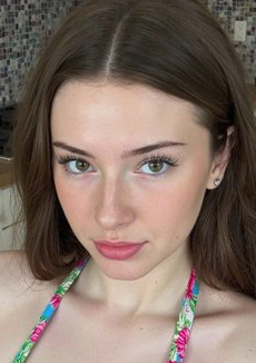 Sultry Brunette Teases Massive Tits in Kitchen Floral Sundress