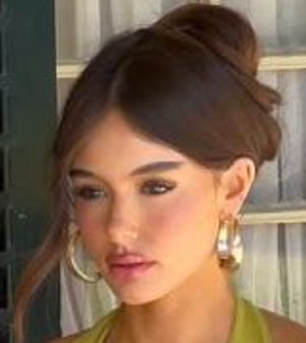 Sultry Brunette in Deep Green Dress Tease